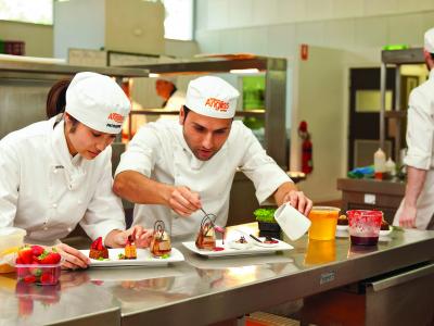 Students adding the finishing touches to some desserts. Photo credit: William Angliss Institute
