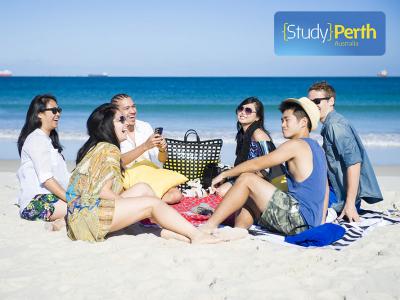 Students relaxing on the beach in Perth, Western Australia. Photo credit: Study Perth